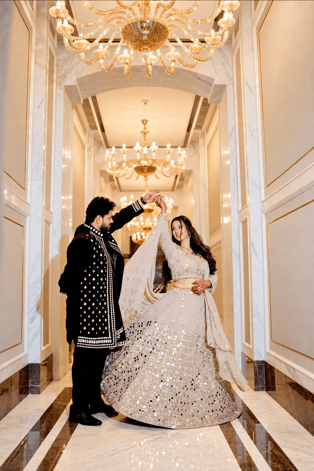 Vishesh and Mahak dancing together in wedding attire